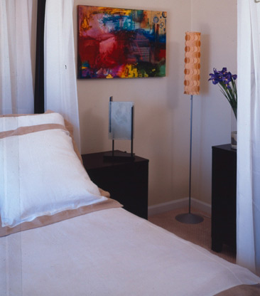 
After: Recycled and biocomposite bedstand lights by Frankie Goes Fluorescent are made of recycled glass and a natural biocomposite of soy flour and recycled paper, with nontoxic finishes.
